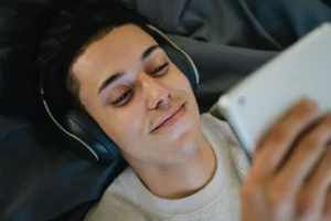 a guy reading text on his phone