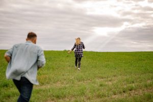 a guy chasing a girl