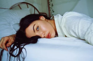 a lady laying on the foam