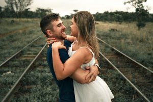 two lovers, crushes on the rail